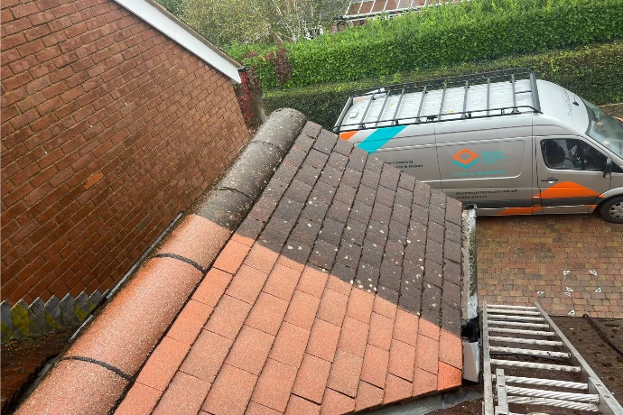 showing the difference between a clean roof and a dirty roof with a 50-50 shot